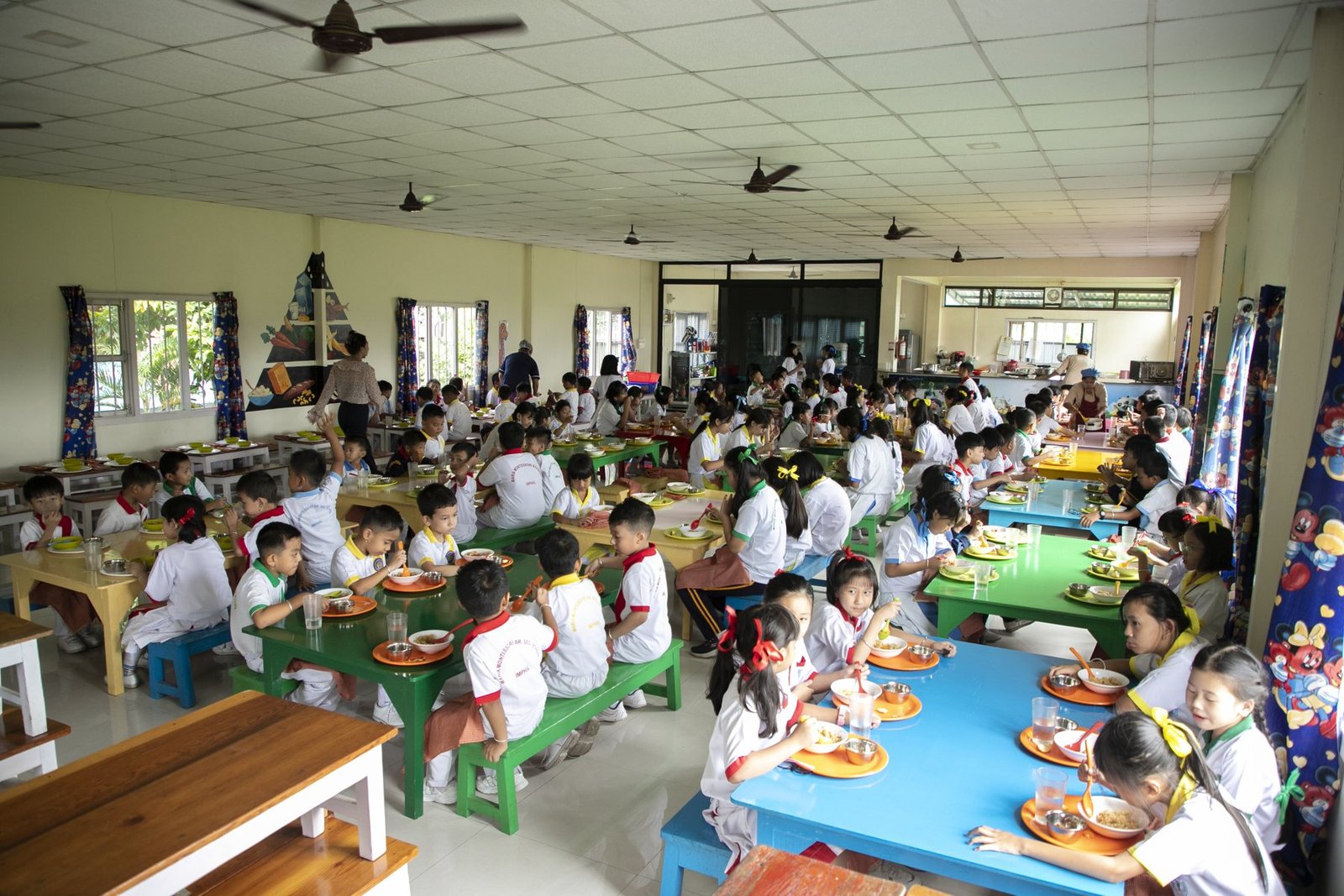 Students having a meal in the school refectory
